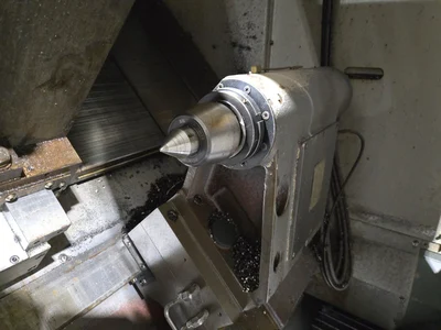 Hyundai SKT-300 CNC Lathe w/ Tailstock and Indexer, 10 Slot Turret, LNS Conveyor, 3-Jaw Chuck, Fanuc