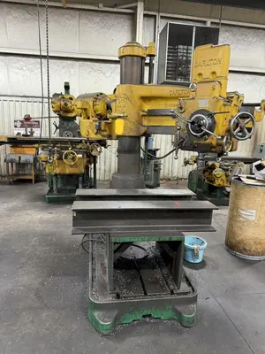 3' X 11" CARLTON RADIAL ARM DRILL. STOCK # 1113924.
