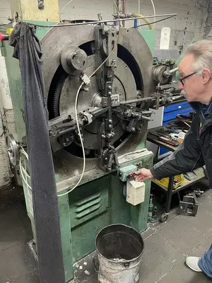 USED BUCH DCM-200 4/40 SPRING MAKING