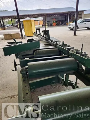 USED NEWMAN M-255 AUTOMATIC FEED TABLE