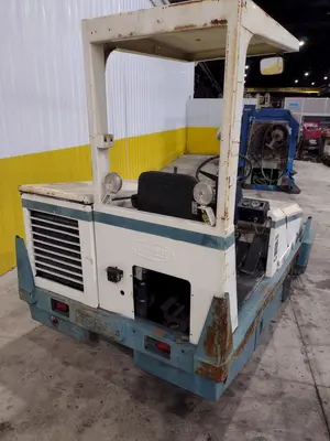 TENNANT MODEL #360 POWERED FLOOR SWEEPER: STOCK #21128