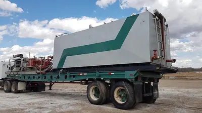 USED NATIONAL JWS-165L TRIPLEX WELL SERVICING REVERSING MUD PUMP TRAILER