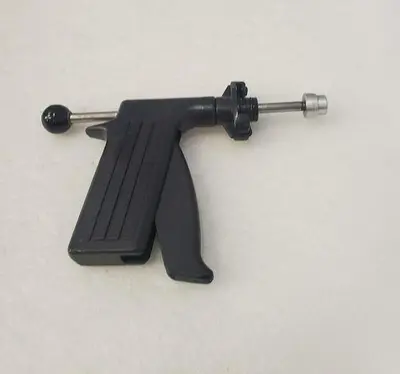 DISPENSING GUN
