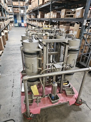 USED 1900 ACCUTEK/CHADAM 2 HEAD GRAVITY FILLER