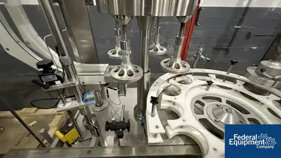 USED Capmatic Capmatic Bottle Filling Line