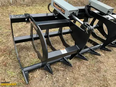 New Tomahawk 78” brush grapple attachment, two hydraulic grapple arms, skid steer quick attach
