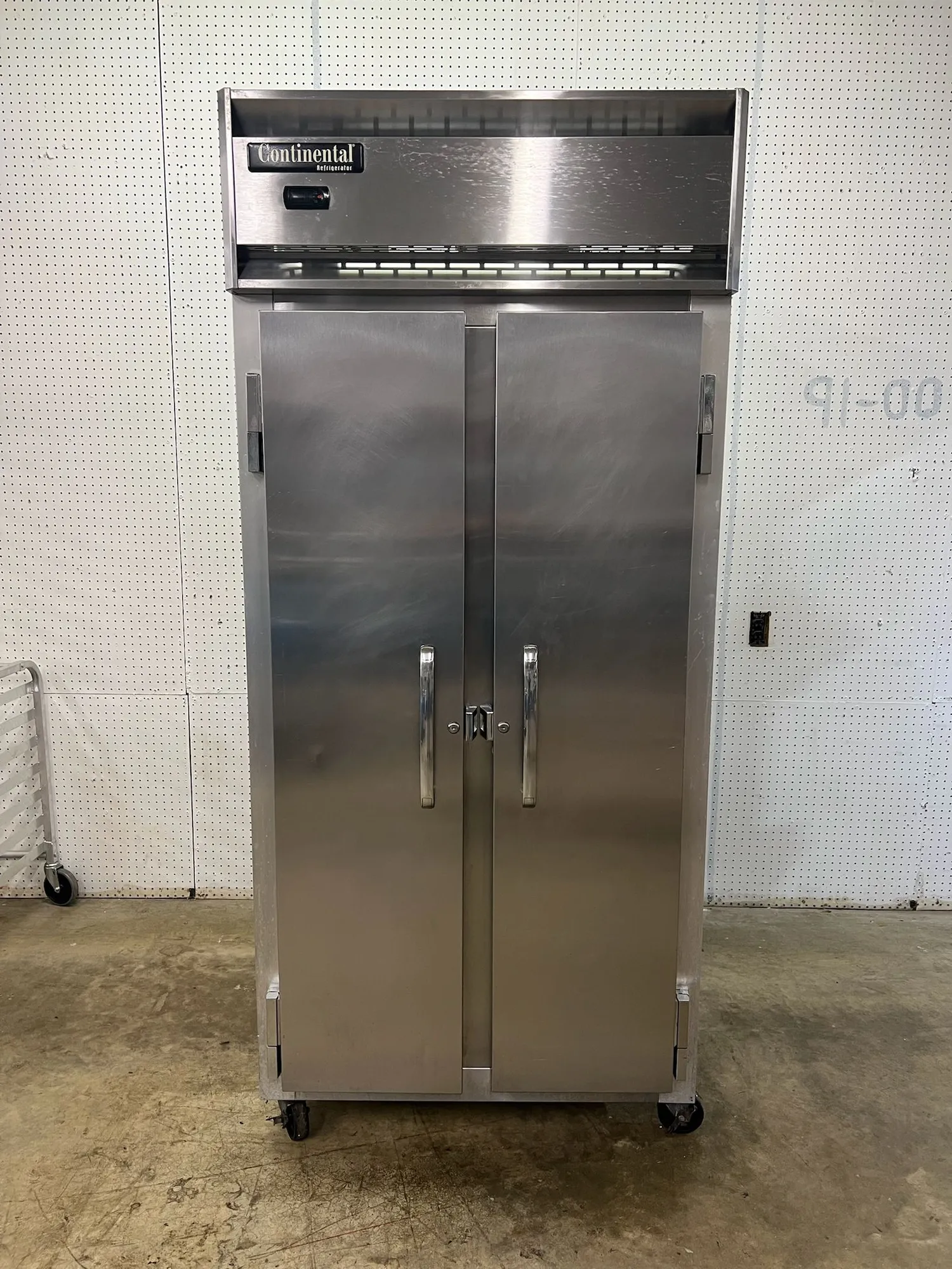 Used Continental Used Continental 2RSEN 36 1/4" Two Section Reach In Refrigerator Solid Doors 115v Refrigerators Illinois US | Falcon Restaurant Supply #1374959