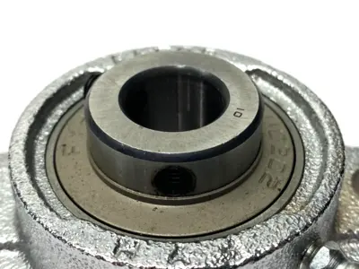 Used FYH Bearing Insert 15mm Bore 31mm OD w/ FL-208 Flanged Mount 2-Bolt Bearings Michigan US | Maverick Industrial Sales #1496175