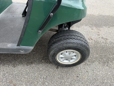 (1) 2015 E-Z-Go golf cart with a Kawasaki gas engine, does not include Club canopy, includes ball wa...