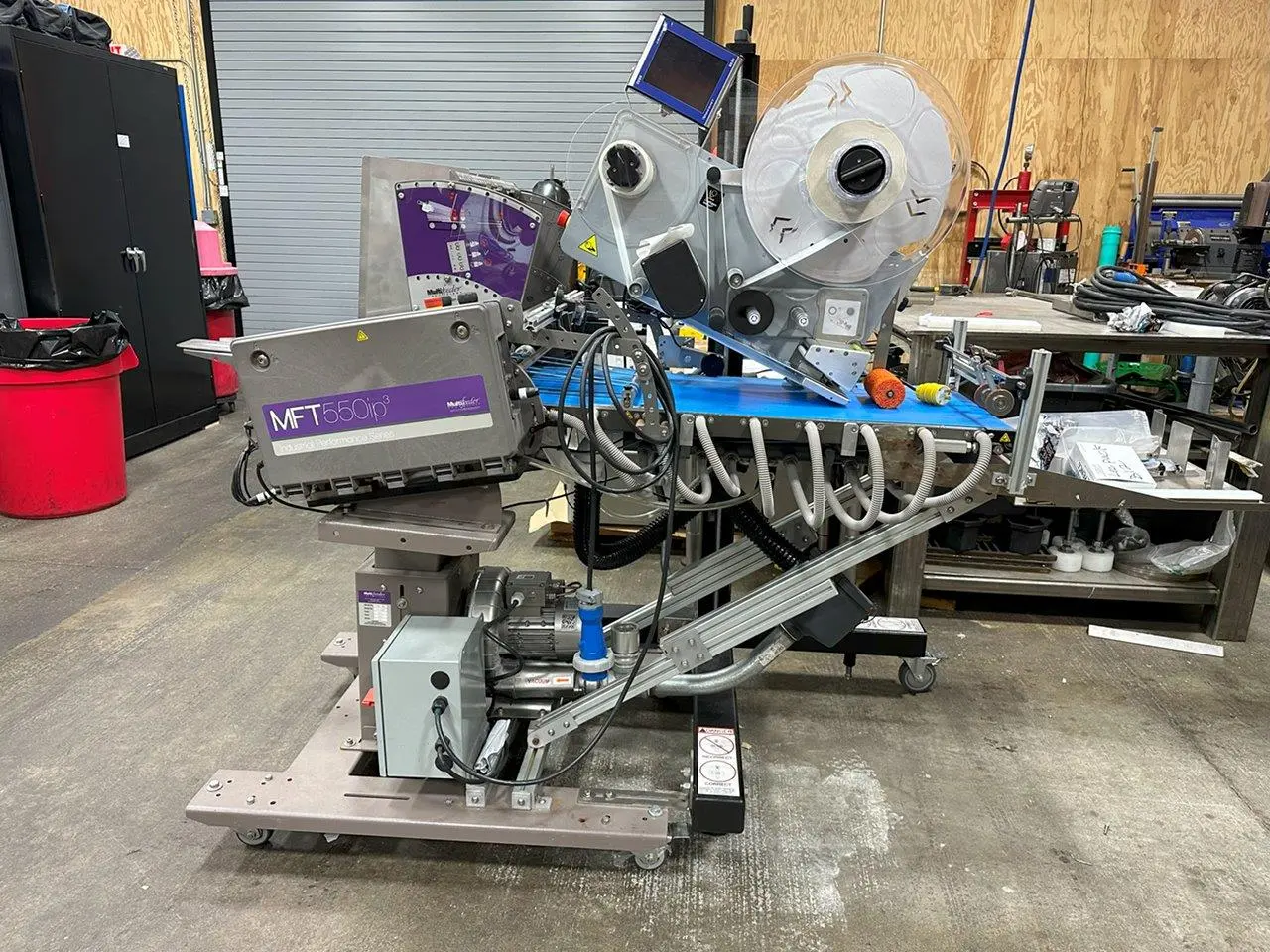 USED MFT 550 IP³ FEEDER AND LABELING SYSTEM