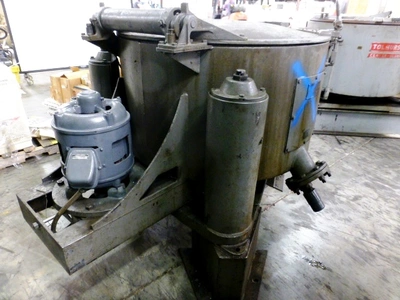 Tolhurst 40" Center-Slung chip wringer.