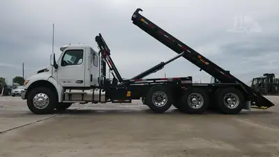 Used 2027 PETERBILT 548 Rolloff Trucks Texas US | Roll Off Truck World #1491999