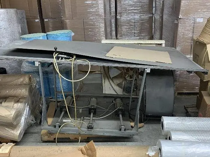 CUSTOM-BUILT LIFTING TABLE FOR UPHOLSTERY FRAMES