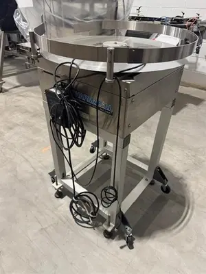 Pharmafill model TTA 24" diameter stainless steel accumulating table