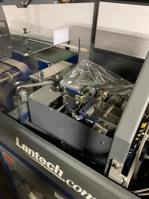 USED LANTECH SW-1000 INTERMITTENT MOTION  BELT FEED SIDE SEAL WRAPPER
