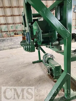 USED NEWMAN M-255 AUTOMATIC FEED TABLE