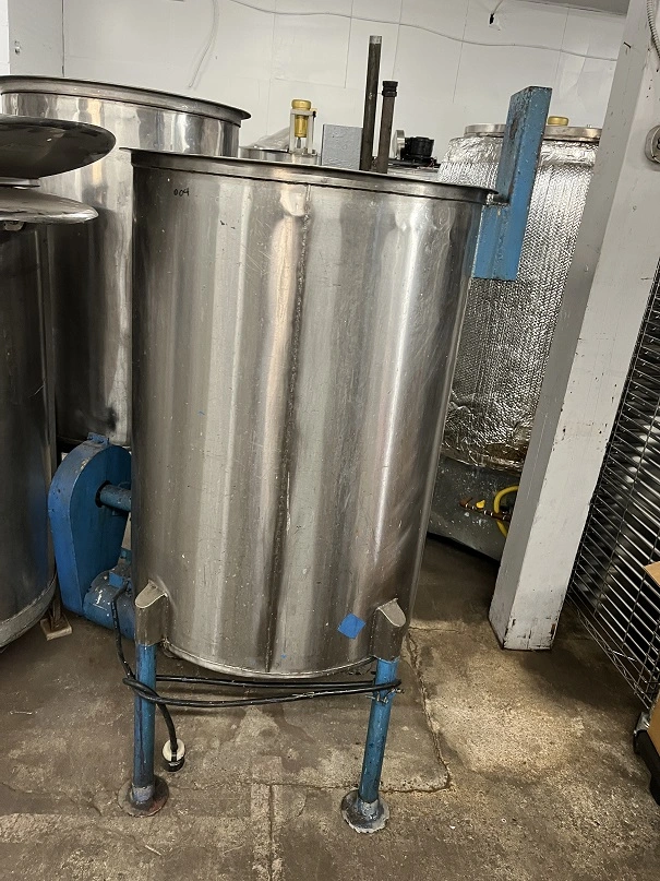 Used approximately 120 gallon stainless steel vertical tank