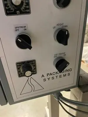 A Packaging Systems Inline Capper