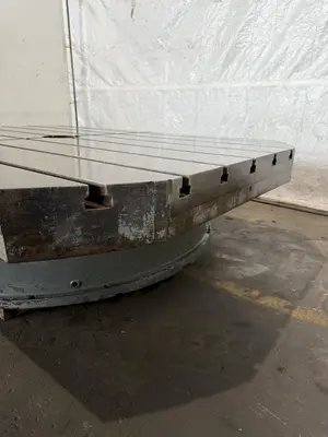 84" X 60" STONE CO ROTARY TABLE. STOCK # 1120524
