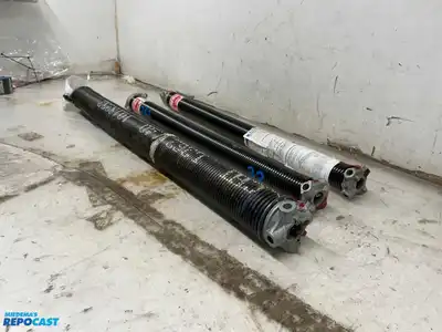 Lot of (3) Sectional Garage Door Torsion Springs (2”, 2”, and 3” Outer Diameter) (32”, 32”, and...