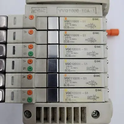 USED SMC SMC VVQ1000-10A-1 BASE WITH 3 VQC12000N-51 & 3 VQC11000N-51 SOLENOID VALVES