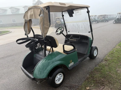 (1) 2015 E-Z-Go golf cart with a Kawasaki gas engine, includes canopy, ball cover, club cover, fold-...