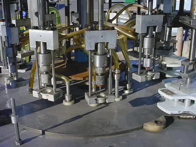 USED 12 HEAD ROTARY VACUUM FILLER 12 HEAD