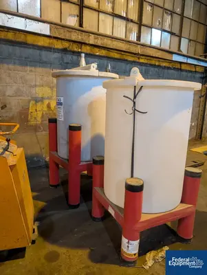 N/A (2) Poly tanks on legs