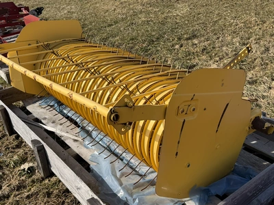 (1) approx. 5' wide pickup unit for a hay baler, unit has some damage, is listed for parts or repair...