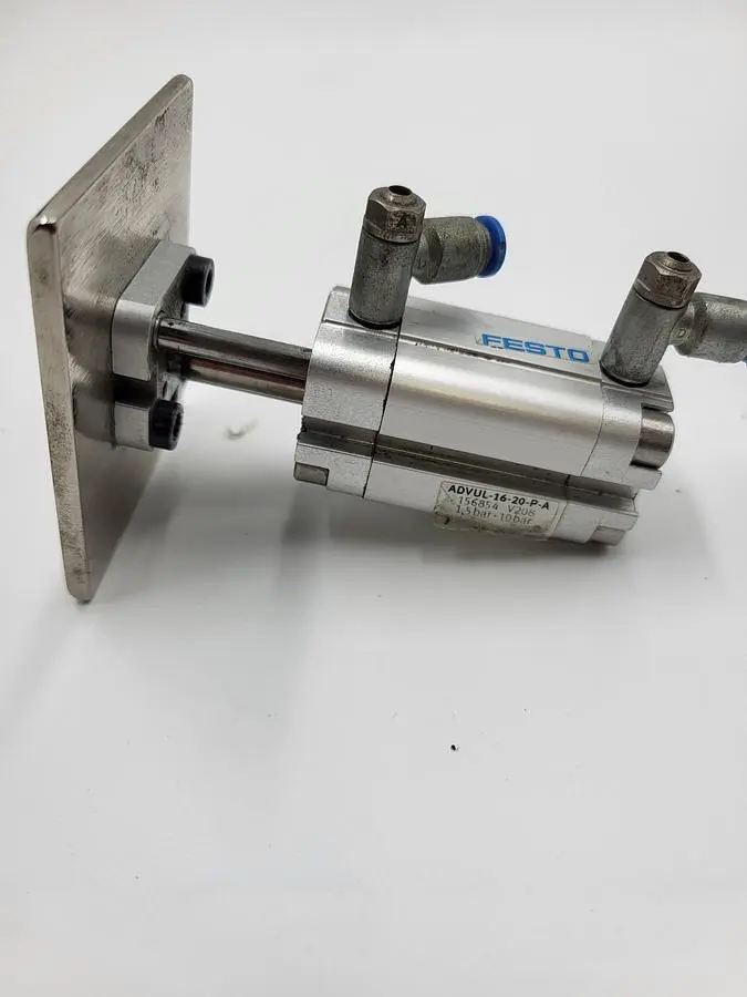 Used FESTO FESTO ADVUL-16-20-P-A COMPACT CYLINDER ATTACHED TO A STAINLESS STEEL PLATE Cylinders | ND Industrial Surplus #1211451