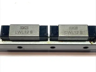 Used IKO Linear Bearing Guide Blocks (2x) w/ Guide Rail 475mm L x 12mm W Linear Guides Michigan US | Maverick Industrial Sales #1395433