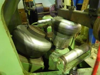 USED HAEUSLER FLANGING MACHINE