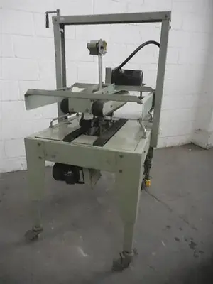 TOP and BOTTOM CARTON SEALER and TAPER