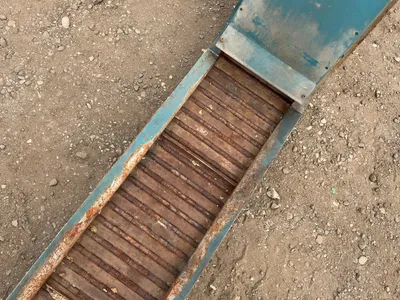 Chip Conveyor, Marathon 1/2hp 208-230/460 Volt 3 Phase Motor, approx. 90” long overall, 9” wide conv...