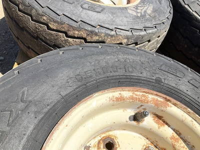 (4) 20.5x8.0-10 tires on steel 6-bolt wheels, used