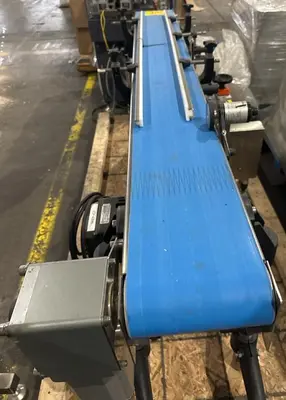 Used Stainless Steel 71” long x 8-1/2” wide motorized conveyor