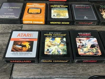 19 - Atari Video Games & 2 Paddle Controllers - see description for more info