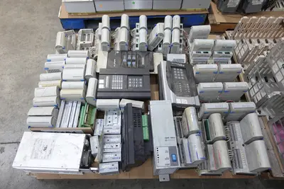 4 PALLETS OF ASSORTED CHASSIS, MODULES AND POWER SUPPLIES; OVATION, HONEYWELL, GE, MODICON