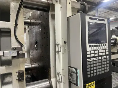USED 2002 MILACRON M T 310-22
