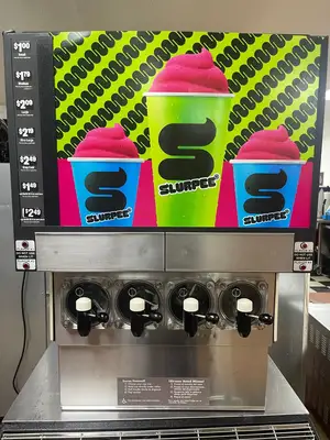 Used FBD MFG Used FBD 564 Frozen Beverage 4 Flavor Dispenser with Drink Station Stand As-Is 220V Slushie Machines Illinois US | Falcon Restaurant Supply #1375592