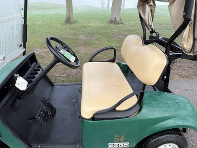 (1) 2017 E-Z-Go golf cart with a Kawasaki gas engine, model 625111G01, includes canopy, ball cover, ...