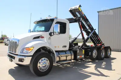 New | in-Stock 2027 PETERBILT 548 Rolloff Trucks Texas US | Roll Off Truck World #1492012