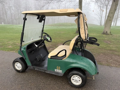 (1) 2017 E-Z-Go golf cart with a Kawasaki gas engine, model 625111G01, includes canopy, ball cover, ...
