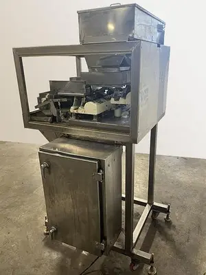 Vibratory Net Weight Bucket Filler