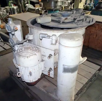 Ametek 26 X 12 perforate basket centrifuge, rubber-lined.