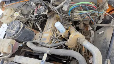 USED 2000 GMC C8500 TANDEM AXLE BED TRUCK