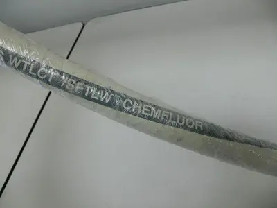 USED 72" FLEXIBLE COMPONENTS HOSE WTLCT/SFTLW CHEMFLUOR W/ 1" NPT ENDS