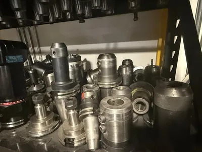 150PC CNC TOOLING LOT: CAT40/50, BT40/50, HSK63, COLLET, END MILL, SHRINK-FIT, BORING HEADS