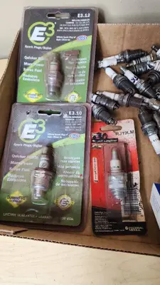 Mixed Brand Spark Plugs and Cleaner Lot including E3, AC Delco, and Champion