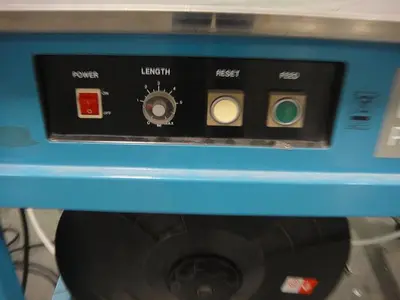 PAC Strapping Machine